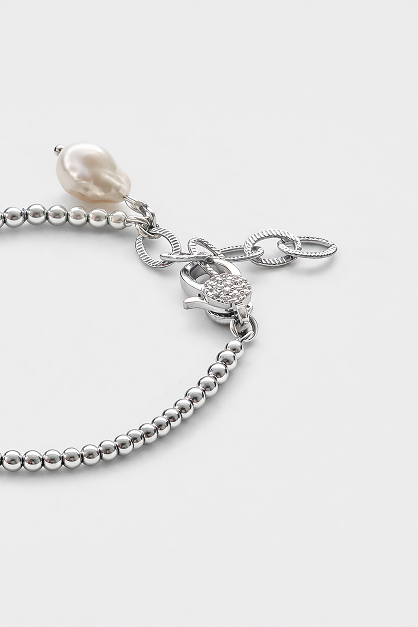 644/B6 Delikatna bransoletka z perłą barokową i cyrkonią